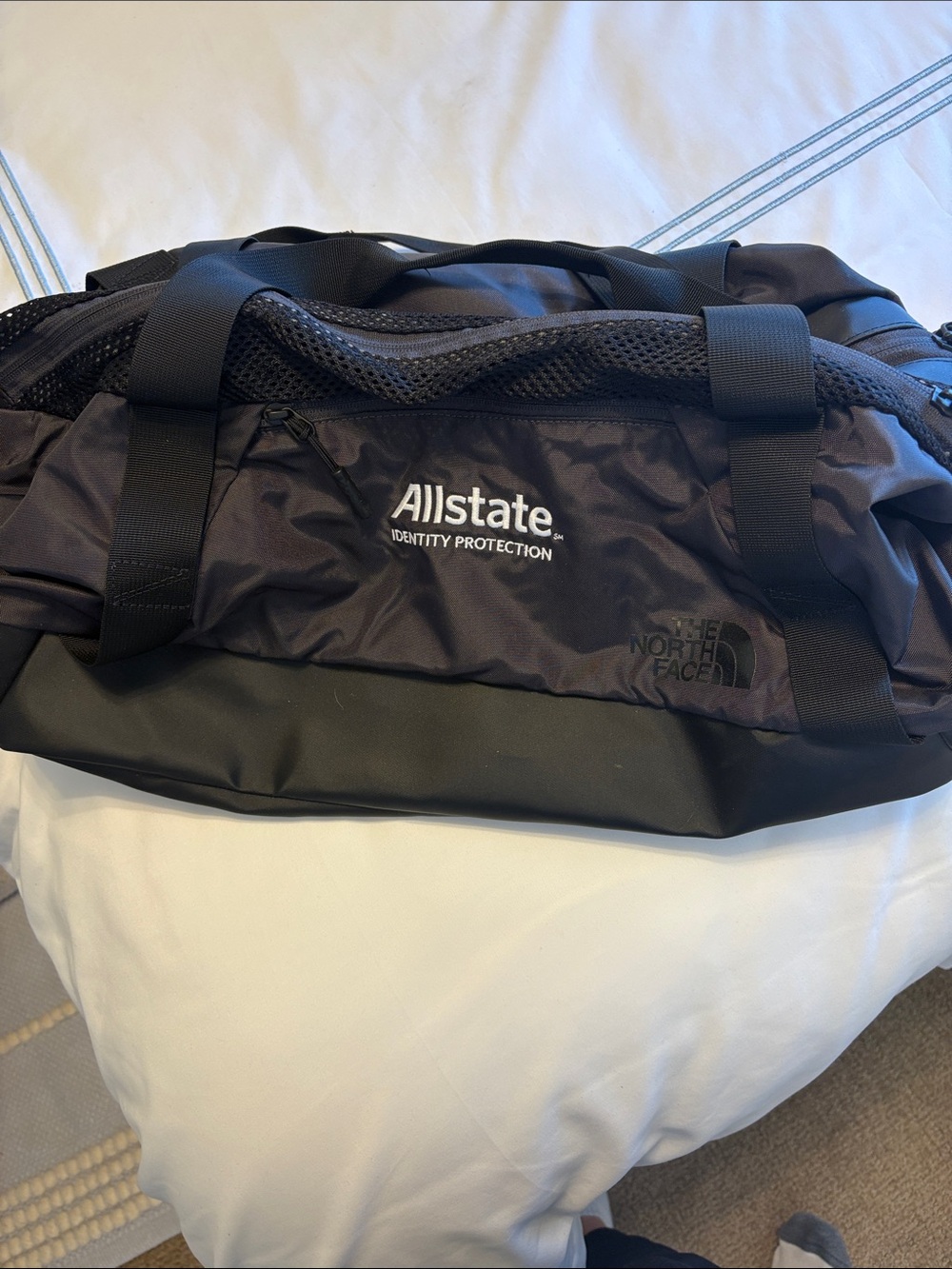The North Face Black Duffel with Allstate Logo